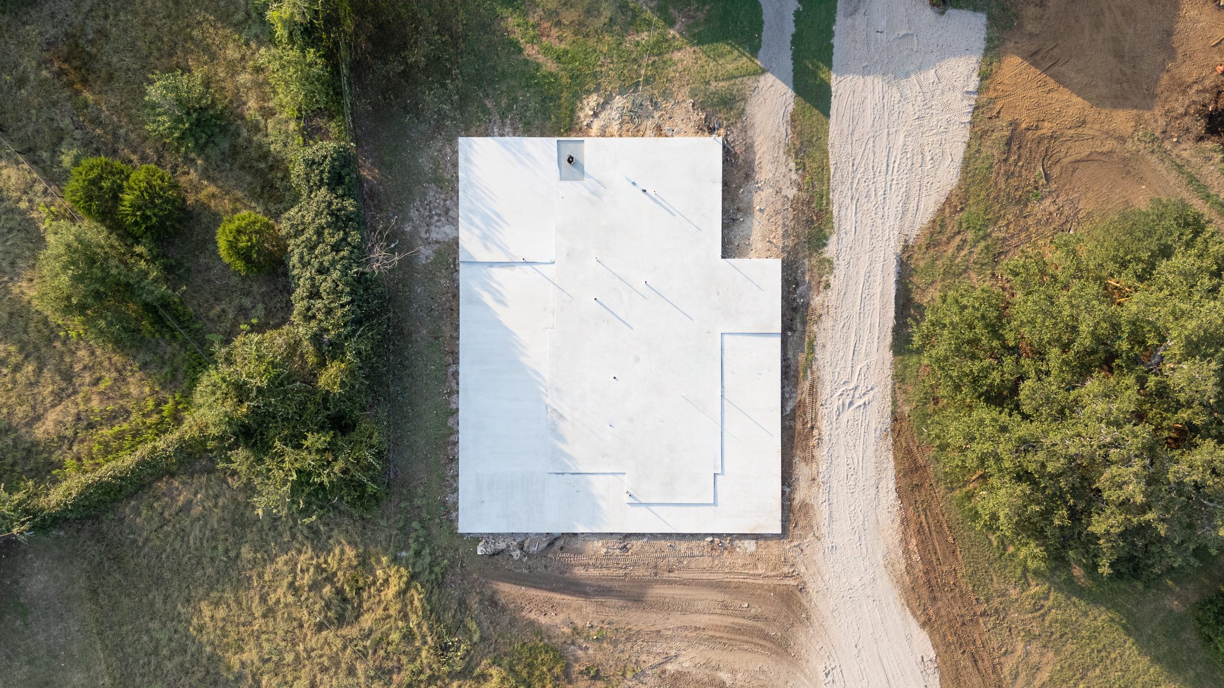 Top-down aerial of a finished slab foundation