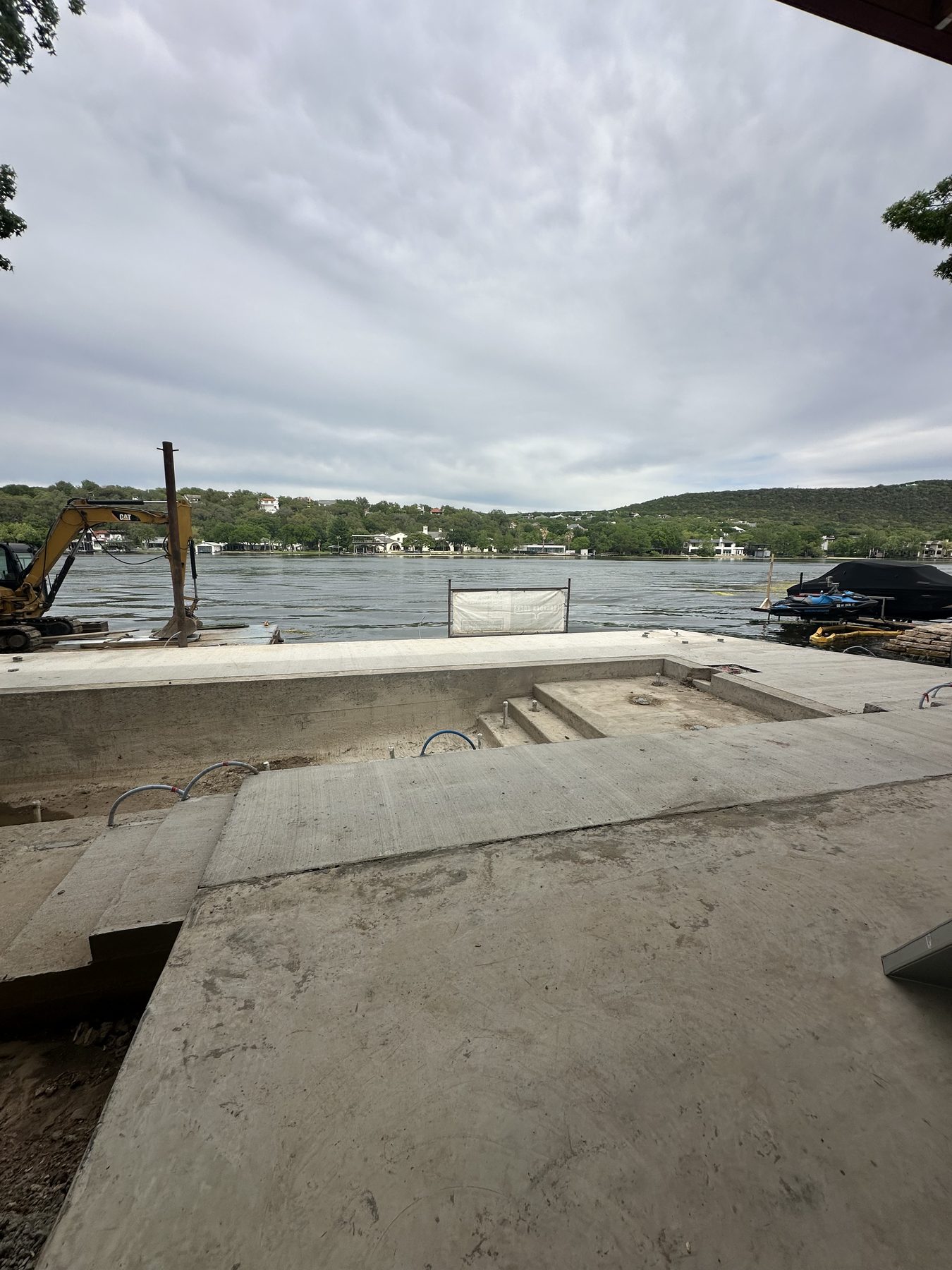 Concrete steps stepping down toward the lake