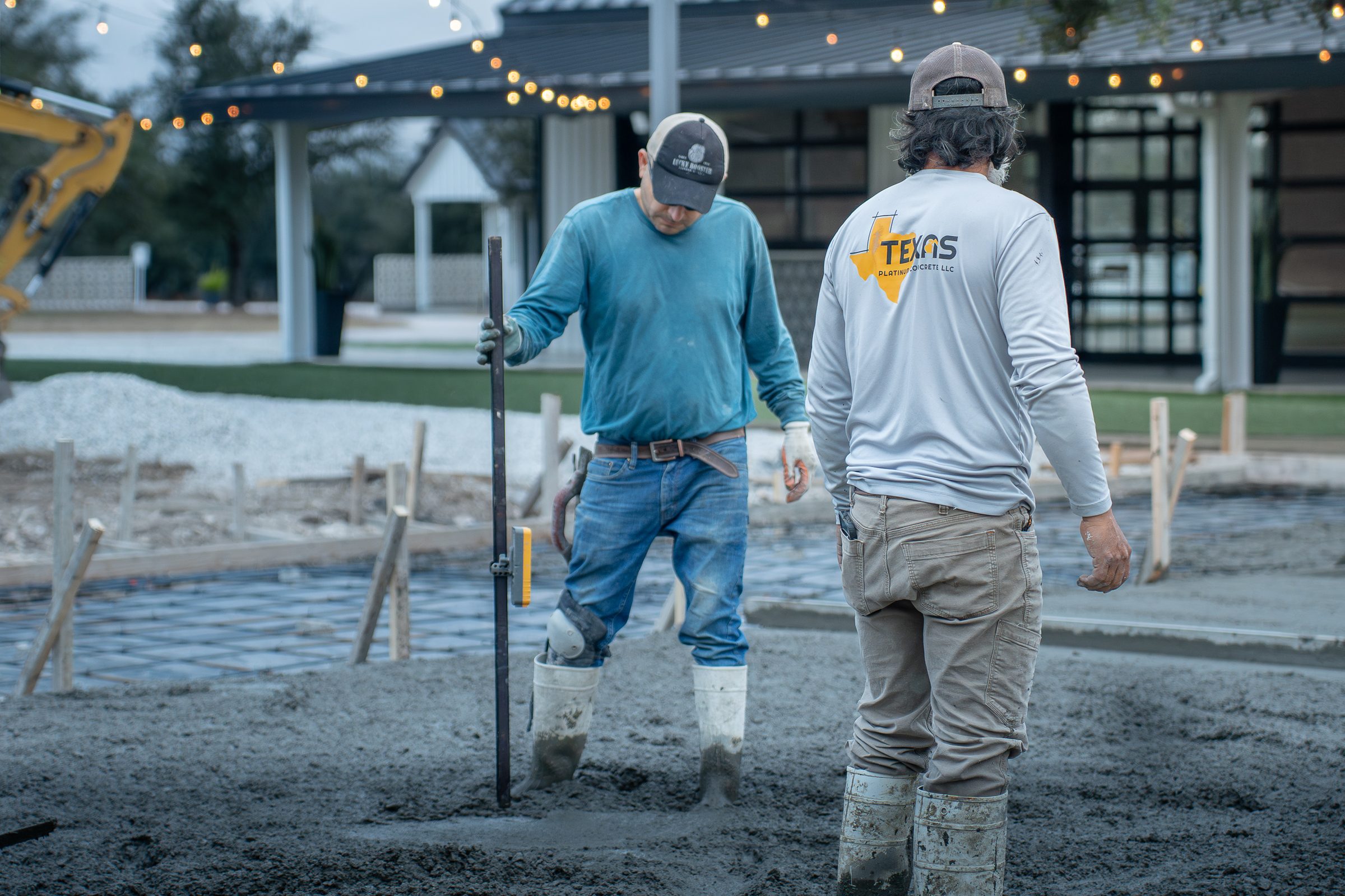 Crew setting grade stakes in front of the venue