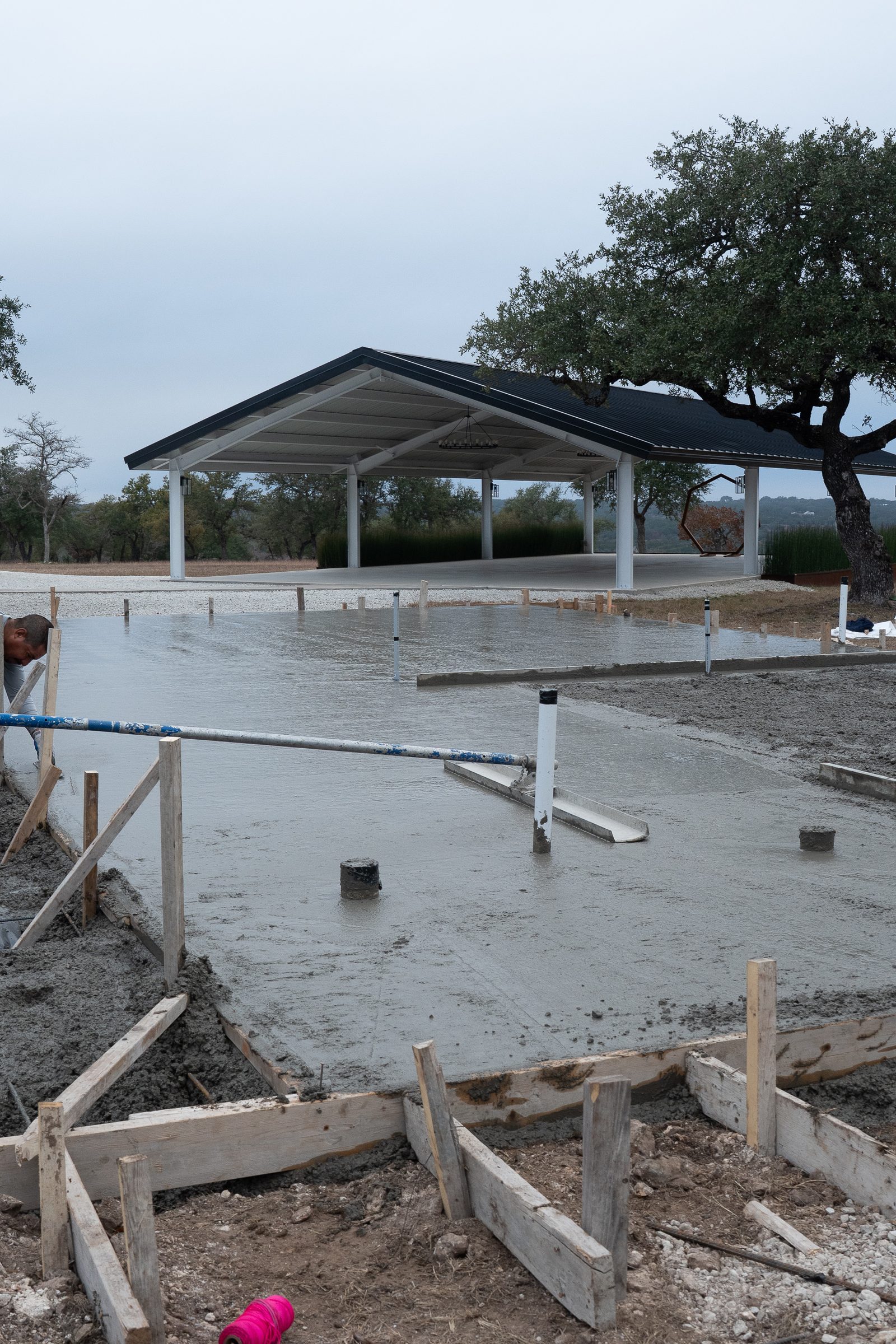 Finished walkway curing between the forms