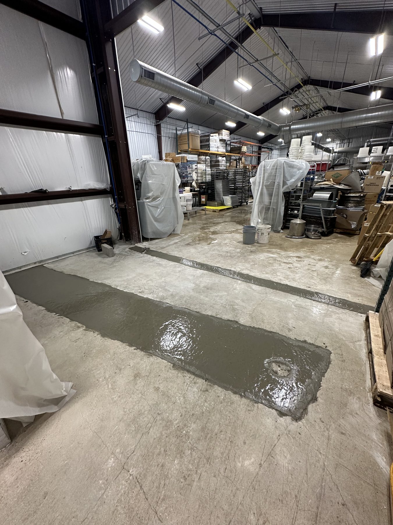 Trench poured back level in a shop floor